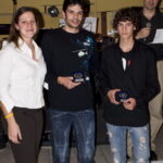 Το μέλος του ΔΣ, Αντιγόνη Σηφαλάκη, απονέμει αναμνηστικές πλακέτες στους Ντοκάκη Μάνο για την κατάκτηση της 5ης θέσης στο πανελλήνιο πρωτάθλημα παίδων και στον Βουρλάκη Δημήτρη (λόγω απουσίας του το παραλαμβάνει ο προπονητής του Μπουρμπάκης Δημοσθένης) για την κατάκτηση της 9ης θέσης στο πανελλήνιο πρωτάθλημα παίδων.